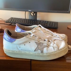 Size 9 golden goose shoes. Style is Hi Star. Sparkly silver star and blue back.